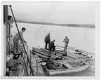 David (deck) Bartlett Cove unloading building supplies ca 1954--POST